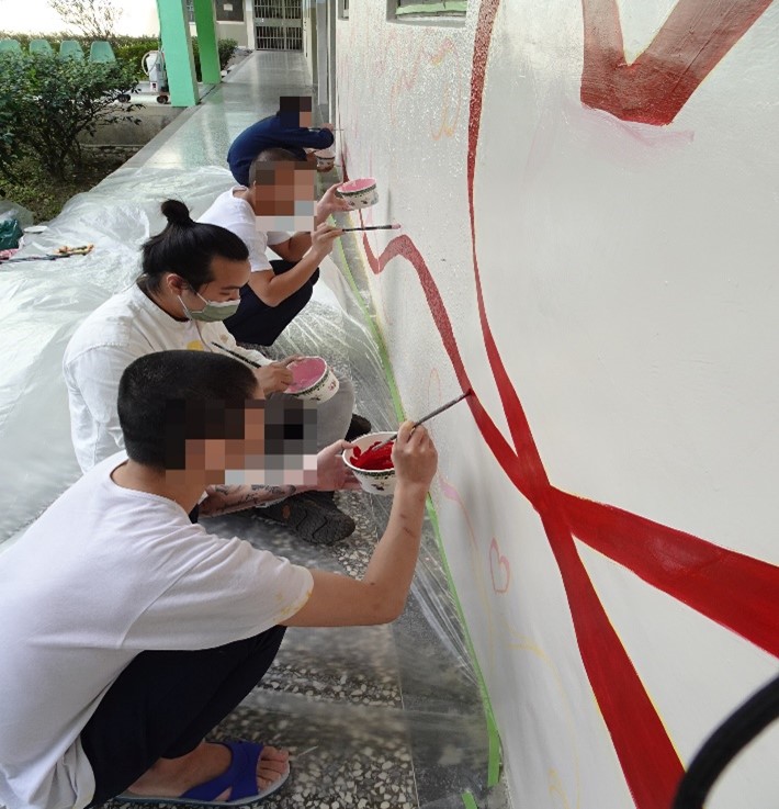 師傅指導少年實作